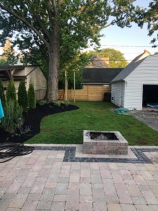 Stone Paver Patio w/ Stone Fire Pit, New Sod, Mulch and Shrubs